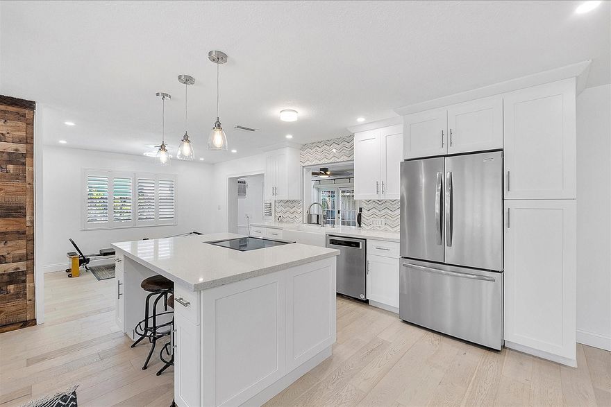 Modern comfort pool home with timeless design. Beautifully renovated home features brand-new French oak wood flooring, the open layout includes a fully updated kitchen with quartz countertops & island and new appliances. Smart home features include Wi-Fi–enabled ceiling fans, a new thermostat, Ring cameras, and an alarm system. Both bathrooms are tastefully remodeled, and key upgrades include a 2017 roof, new A/C, & a tankless water heater. Outdoors, enjoy a sparkling pool, spa, shower, and 2 spacious patio areas with pergolas—all within a fenced backyard. Adt'l highlights include recessed lighting. Low annual HOA fee. Conveniently located. Bundled service pricing available for buyers. Connect with the listing agent for details. Ask about the assumable VA loan with 3.5% interest rate.