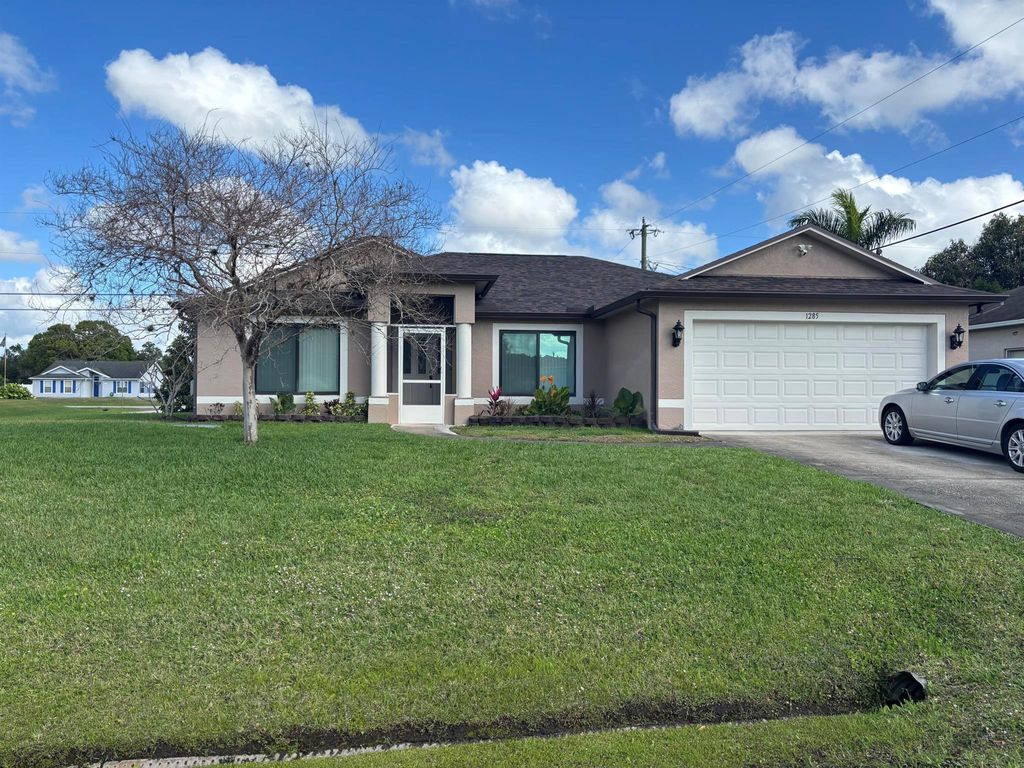 Photo of 1285 SW Bellevue Avenue, Port St Lucie, FL 34953 (MLS # R11063073)