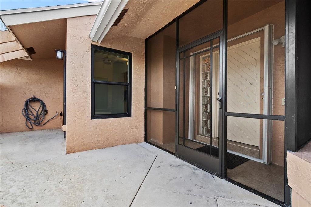 Photo of 11004 Hidden Lake Place, Boca Raton, FL 33498 (MLS # R11112842)