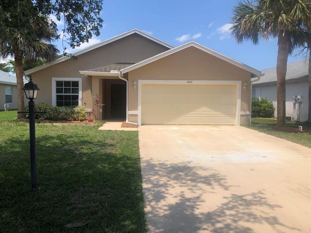 Photo of 2627 SW Marquis Terrace, Stuart, FL 34997 (MLS # R10886259)