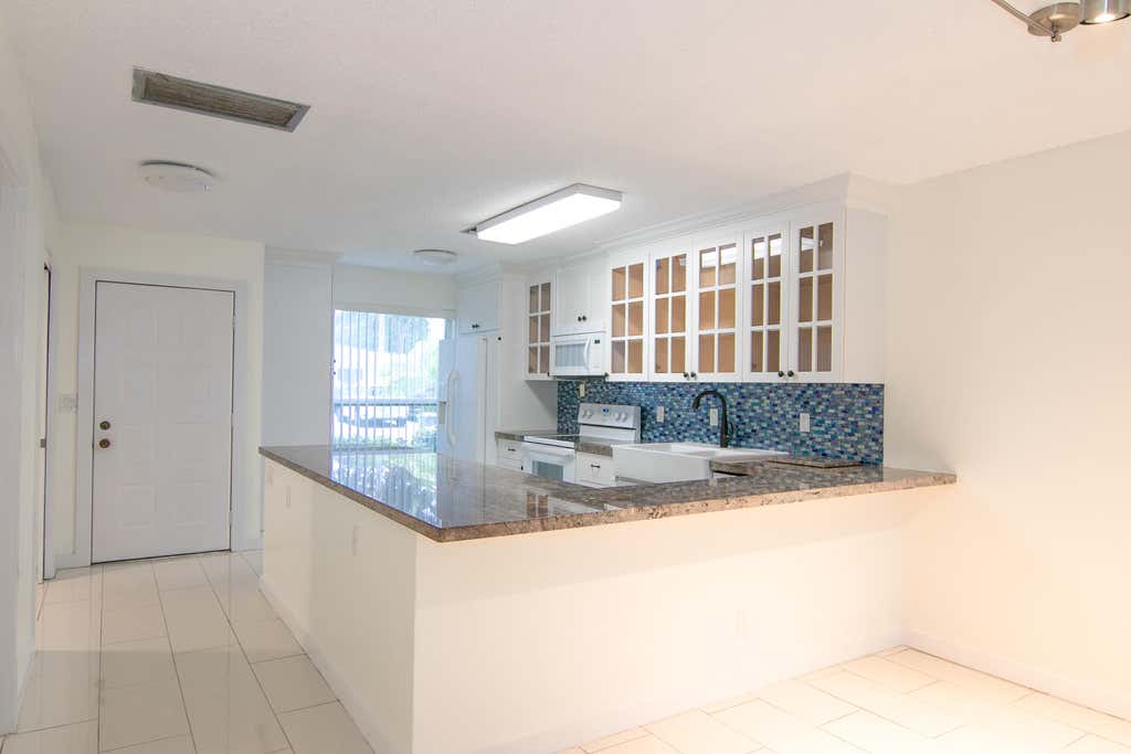Photo of 13741 Flora Place #B, Delray Beach, FL 33484 (MLS # B26033904)