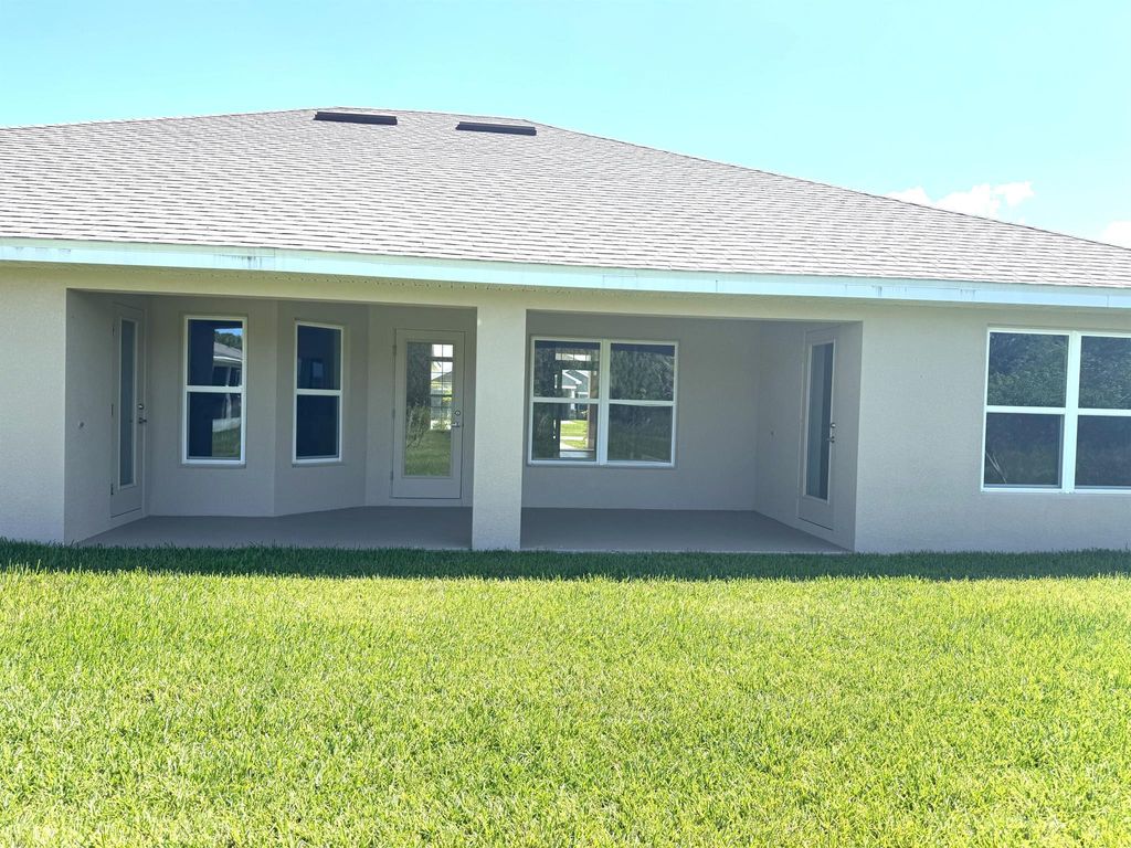 Photo of 8728 Waterstone Boulevard, Fort Pierce, FL 34951 (MLS # R11094569)