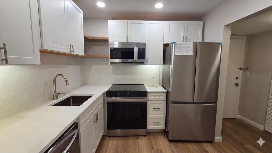 Completely renovated 2/2, 1st-floor condo offering easy living in the heart of Pompano Beach! Brand-new kitchen, new flooring throughout, and two fully remodeled bathrooms give this condo a clean, modern look. The split-bedroom layout is comfortable and functional, and you'll enjoy the screened patio, too! The patio faces east, bringing in natural light while avoiding the direct morning sun. It's a comfortable spot to enjoy your coffee, read, or simply relax. Located in the well-kept community of Barcelona, the many amenities include a pool, tennis courts, clubhouse, and more, this home also puts you close to the beach, major highways, shopping, dining, and the energy of the ever-growing downtown Pompano Beach. If you've been looking an updated condo in a great location, this is it!