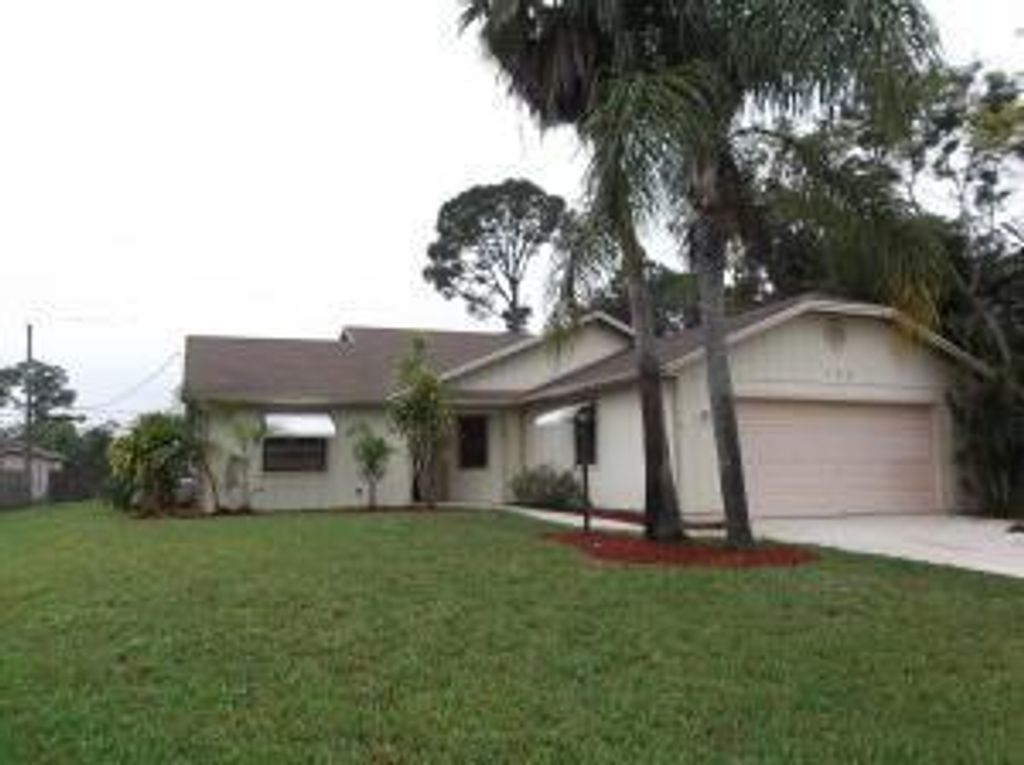 Photo of 150 NW Friar Street, Port Saint Lucie, FL 34953 (MLS # R10729714)
