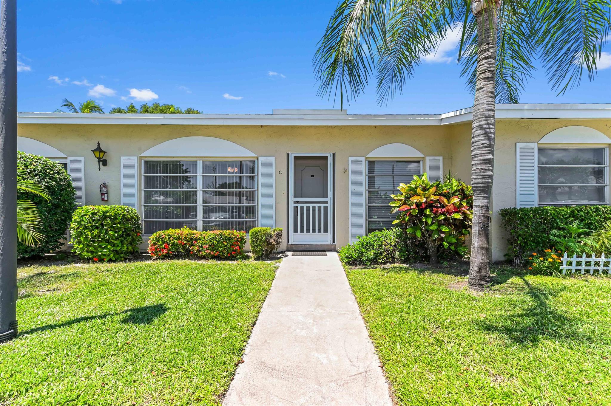 Best Value Around!Don't miss this incredible opportunity to own a beautifully maintained 2-bedroom, 2-full-bath villa in one of the most sought-after 55+ communities in the area! This charming home offers both comfort and convenience, featuring a newer A/C (2022) and a spacious layout perfect for relaxed living.Enjoy your morning coffee or evening BBQs on the lovely back patio with pavers--an ideal spot to entertain or unwind. This section of the community boasts one of the lowest HOAs around, and there are NO assessments--making this one of the best deals you'll find!