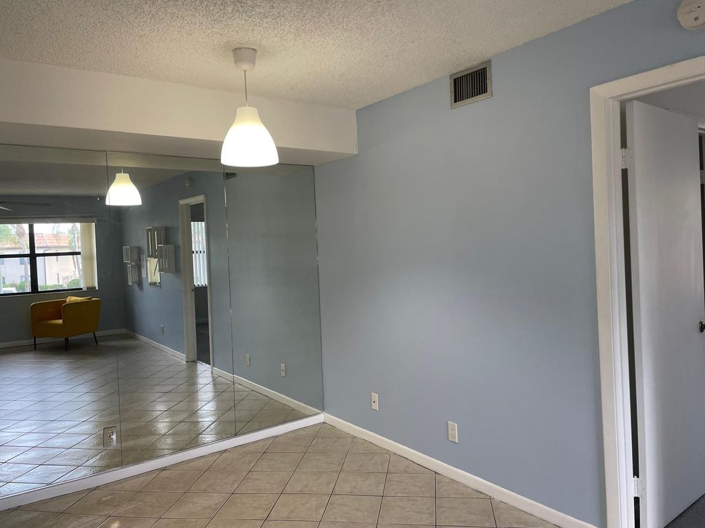 Photo of 7070 Golf Colony Court #201, Lake Worth, FL 33467 (MLS # R11091573)