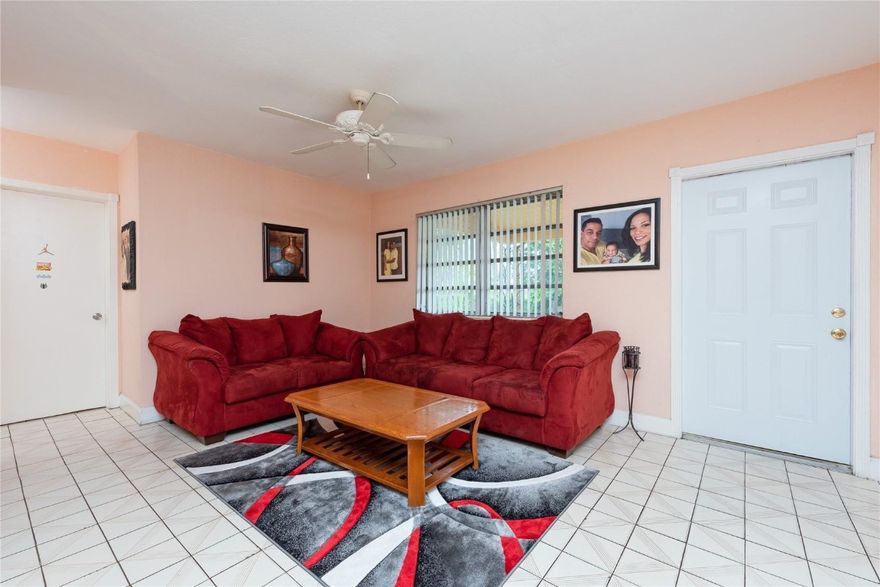 VACANT AND BACK ON THE MARKET!!!Move in ready, this West Park home features three Extra Rooms (two Florida rooms and a large utility room).  A total of 6 (SIX) Rooms. Currently set up to accommodate shared living arrangement.   East facing covered patio to sit and enjoy your beautiful fenced backyard with producing fruit trees. Hurricane shutters. Expansive driveway where at least four vehicles can be parked. Don't miss it.  For offers please see Brokers Remarks.