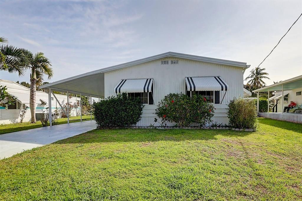 Photo of 7639 SE Fork River Drive, Stuart, FL 34997 (MLS # R10789756)