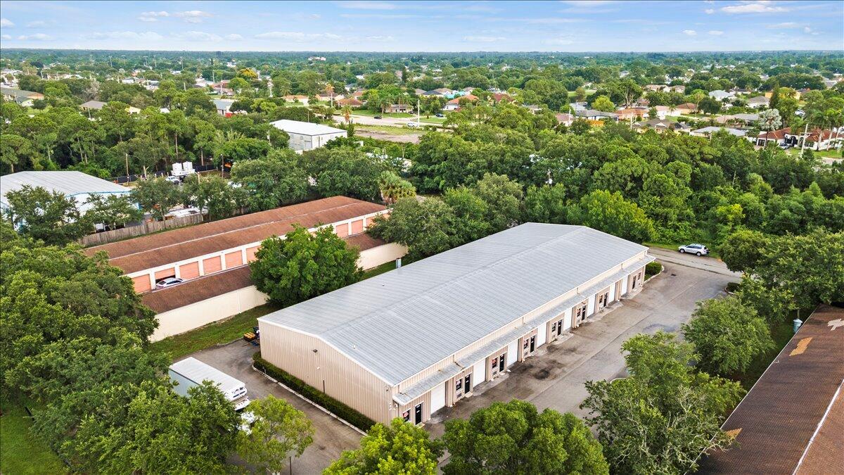 Centralized flex industrial condo unit built out as commercial kitchen facility. The unit contains 2,470 SF of ground floor area with an additional 1,400 SF of 2nd floor storage & offices. Turnkey food production facility with tile floors and floor drains, grease trap, 16' hood, 100% AC'd and upgraded plumbing system. Excellent setup for catering & food distribution! Additional units available for larger kitchen area and refrigerator / freezer space.