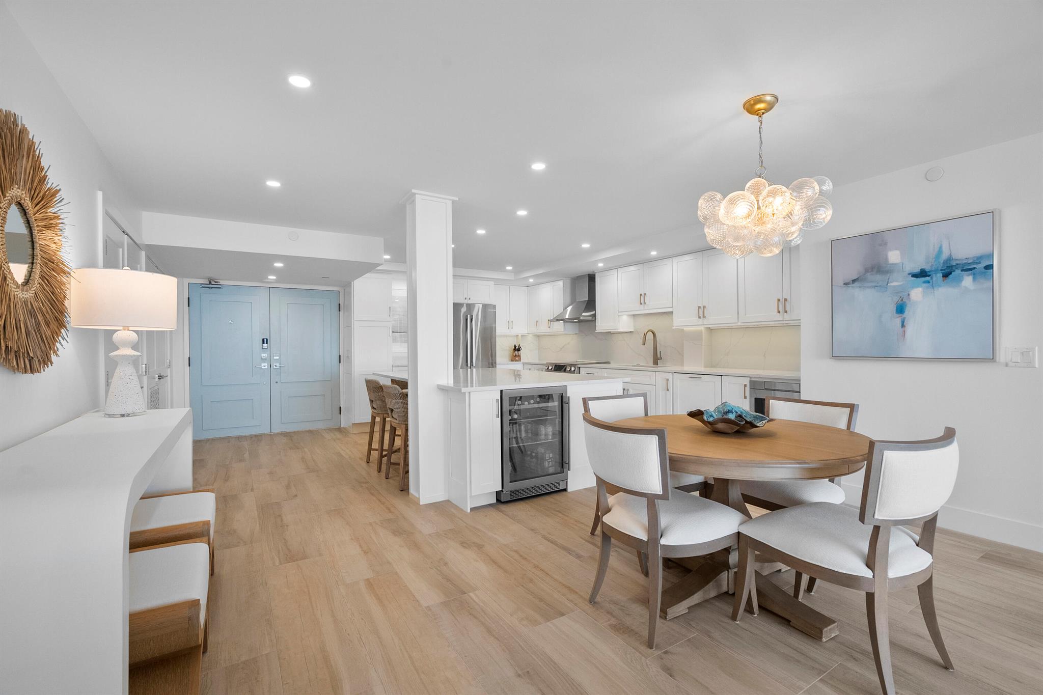 This beautifully updated 2-bedroom, 2-bathroom condo at Miramar 2 on Hutchinson Island offers over $200,000 in custom upgrades and unmatched oceanfront living. The wide-open kitchen is a showstopper, featuring a massiveisland, quartz countertops, and high-end appliances, seamlessly flowing into the living and dining areas with tile floors throughout. Both bathrooms have been beautifully updated with spa-like finishes, creating a luxurious, relaxing retreat. What makes this condo truly one-of-a-kind is that both bedrooms and the living space showcase stunning ocean views, with over 40 feet of water frontage--an exceptional feature rarely found on Hutchinson Island. Comfort and convenience are ensured with a newer AC and tankless hot water heater.