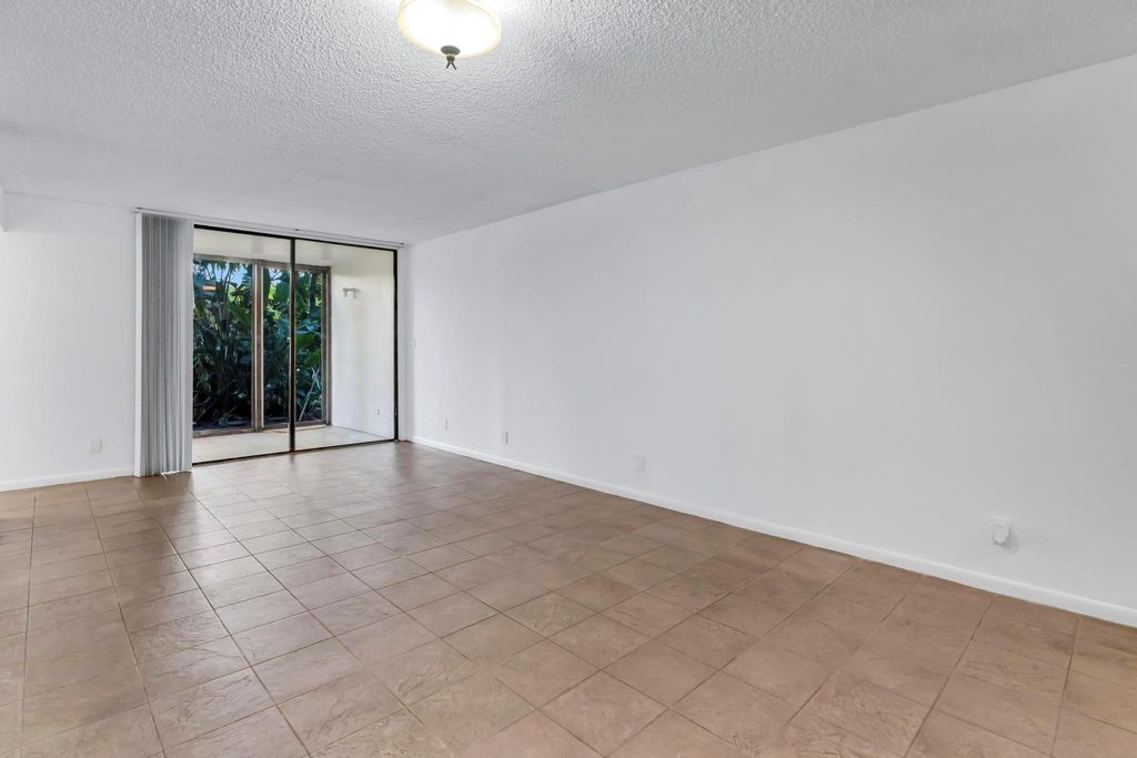 Photo of 210 Lake Pointe Drive #103, Oakland Park, FL 33309 (MLS # F10542214)
