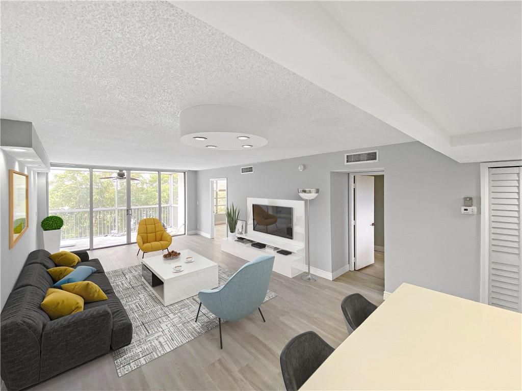 Photo of 3010 N Course Dr #609, Pompano Beach, FL 33069 (MLS # F10274368)