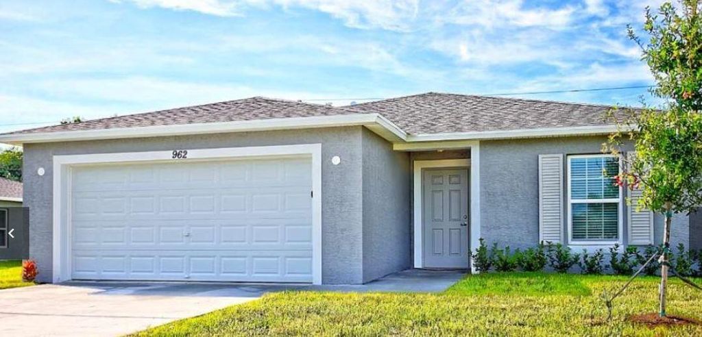 Photo of 3574 SW Masilunas Street, Port St Lucie, FL 34953 (MLS # R10903240)