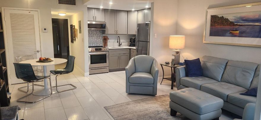 Beautifully redone garden level 1 bedroom 1.5 bathroom apartment in East Boca Raton. Live in or own and lease with fantastic rental income. Recent total renovations include tile floors, both bathrooms and kitchen with all new appliances, quartz counter tops and hurricane impact windows and doors. Move right into this gem. Newer roof on building and newer AC system. Special assessment 72.79 through 2029. Buyer to confirm terms.