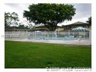 Tastefully remodeled condo 2 bedrooms, 1 bathroom, impact windows, washer and dryer in unit, shared 1 car garage.