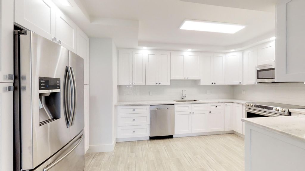 Photo of 3980 Oaks Clubhouse Drive #407, Pompano Beach, FL 33069 (MLS # B26018258)