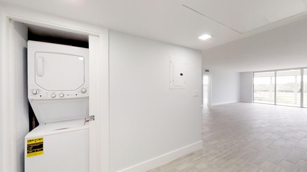 Photo of 3980 Oaks Clubhouse Drive #407, Pompano Beach, FL 33069 (MLS # B26018258)