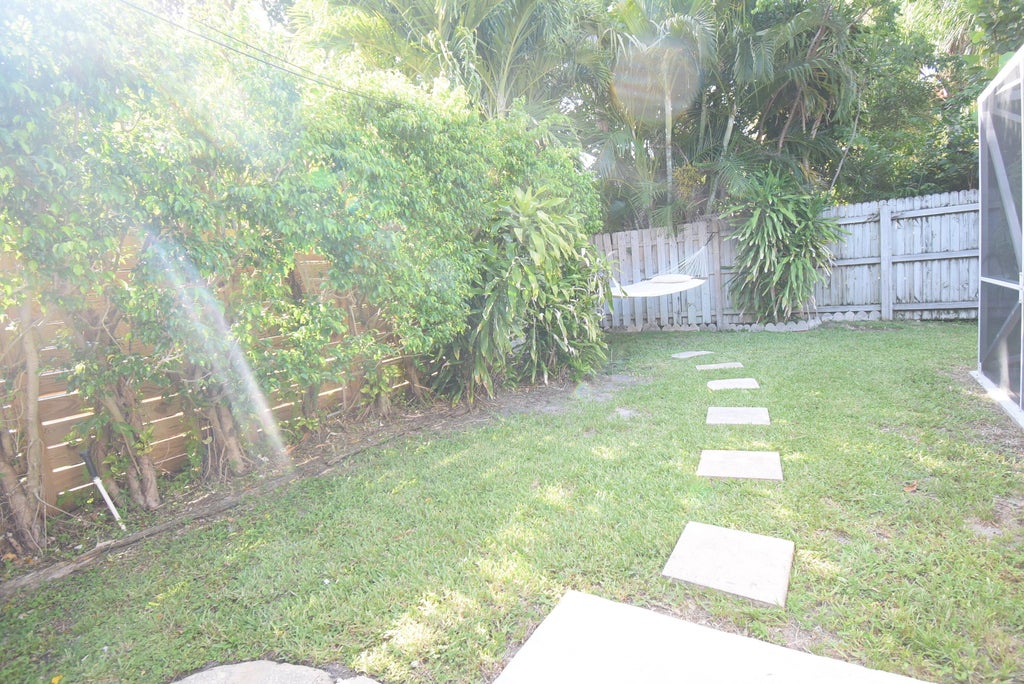 Photo of 701 NW 6TH Drive, Boca Raton, FL 33486 (MLS # B26056892)