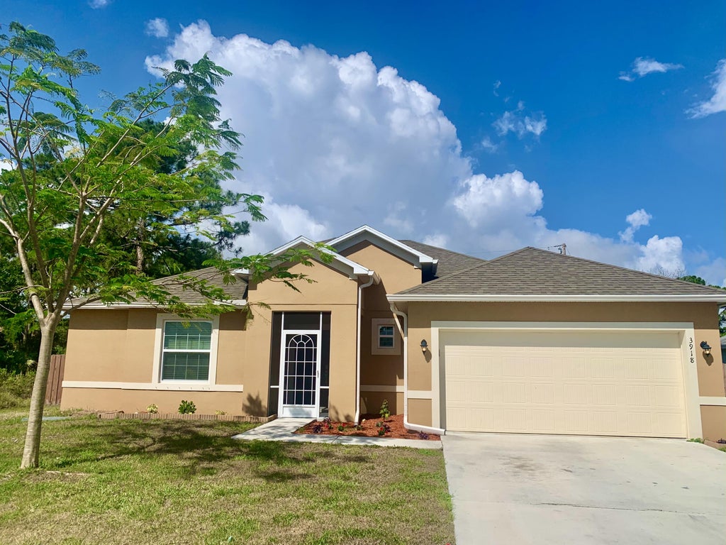 Photo of 3918 SW Kakopo Street, Port Saint Lucie, FL 34953 (MLS # R10799182)