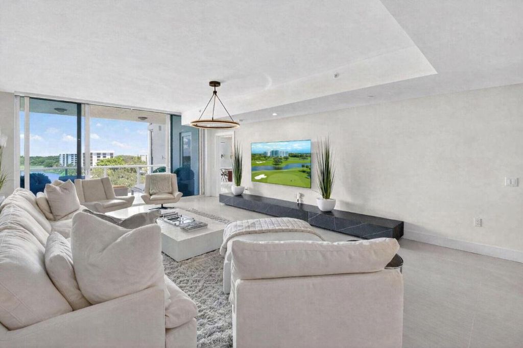 Photo of 20155 Boca West Drive #C504, Boca Raton, FL 33434 (MLS # R11151103)