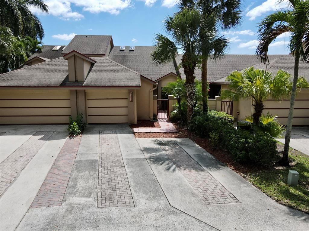 Photo of 2404 Landings Boulevard Blvd, Green Acres, FL 33413 (MLS # R10697141)