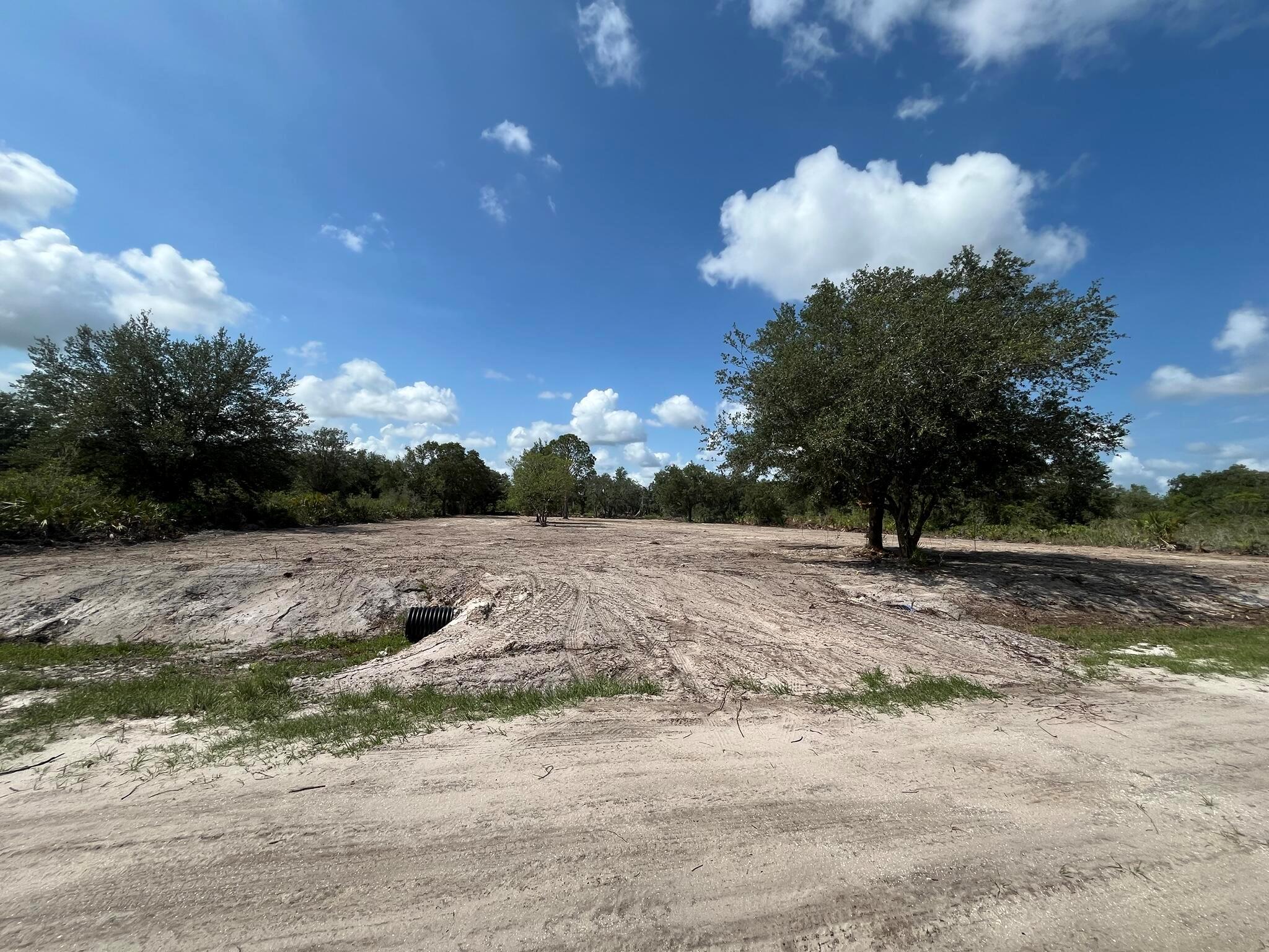 Build or bring your dream home on this spacious 1.25-acre cleared lot. Cleared with culvert in place. Not far off the paved road. Residents can enjoy the privacy of a rural setting while still being close to essential amenities. The area is a haven for outdoor enthusiasts, boasting attractions like the Kissimmee River Preserve State Park and the expansive Lake Okeechobee, famous for its excellent fishing opportunities. Whether it's fishing, hunting, agriculture, or simply a desire for privacy, Okeechobee County provides an idyllic backdrop to create a personalized retreat.
