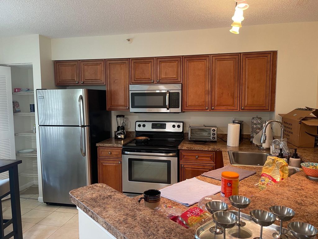 Photo of 2205 S Cypress Bend Drive #106, Pompano Beach, FL 33069 (MLS # F10497053)