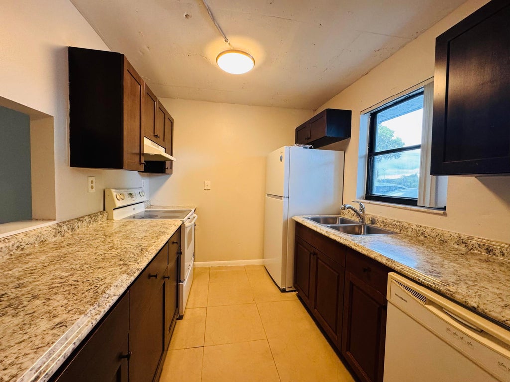 Photo of 2050 N CONGRESS Avenue #102, West Palm Beach, FL 33401 (MLS # B26080141)