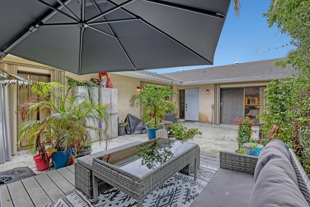 Photo of 8037 Ambach Way, Hypoluxo, FL 33462 (MLS # R11120563)