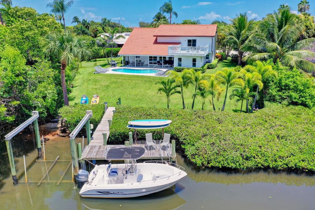 Photo of 141 Pine Hill Trail W, Tequesta, FL 33469 (MLS # R10978543)