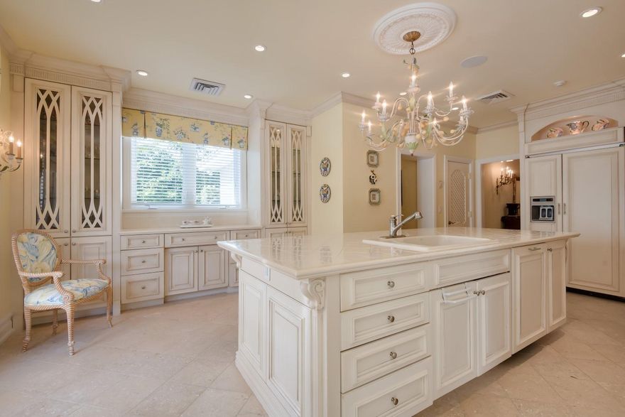 Two story Bermuda residence located on the ocean block, conveniently close to the beach and lake trail.  Recently updated, the home features 5 bedrooms, 5 bathrooms plus powder room, a gourmet kitchen with stainless appliances, 2 car garage, and detailed millwork. Spacious patio with covered dining area, large pool, spa, and summer kitchen.