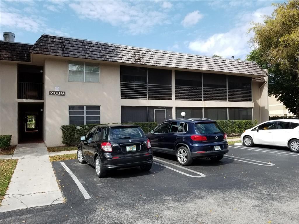 Photo of 2830 Riverside Dr #204-B, Coral Springs, FL 33065 (MLS # F10271200)