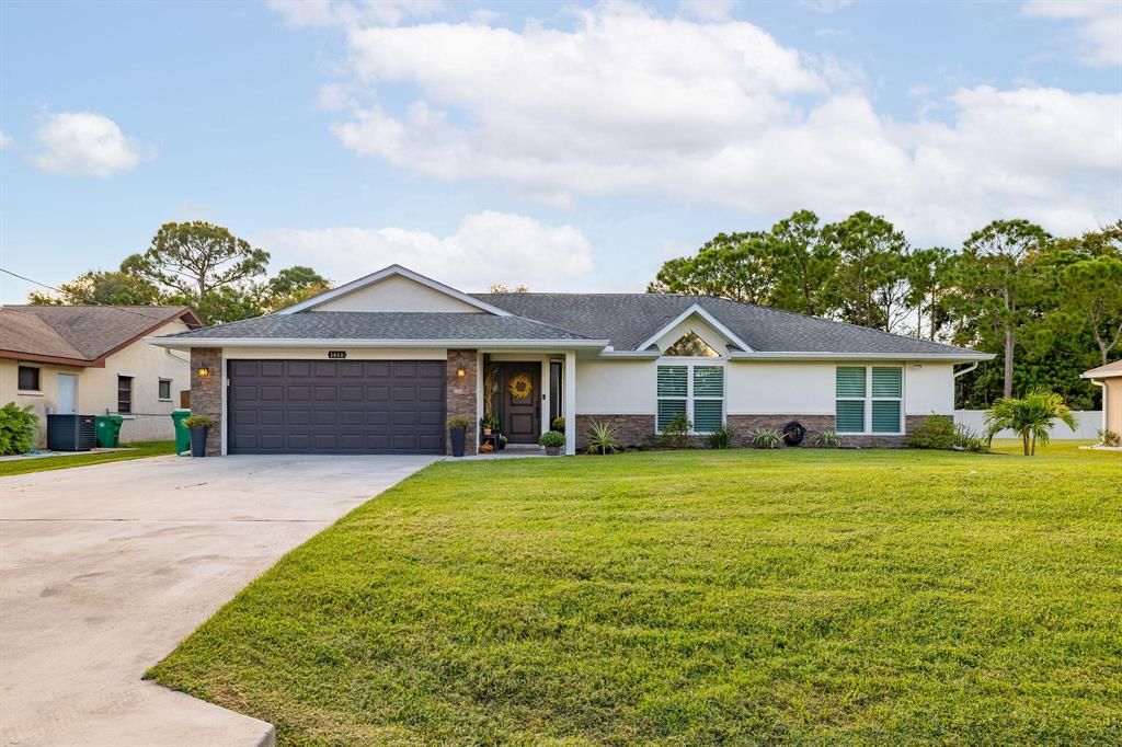 Photo of 1418 SW Broadview Street, Port Saint Lucie, FL 34983 (MLS # R10748681)
