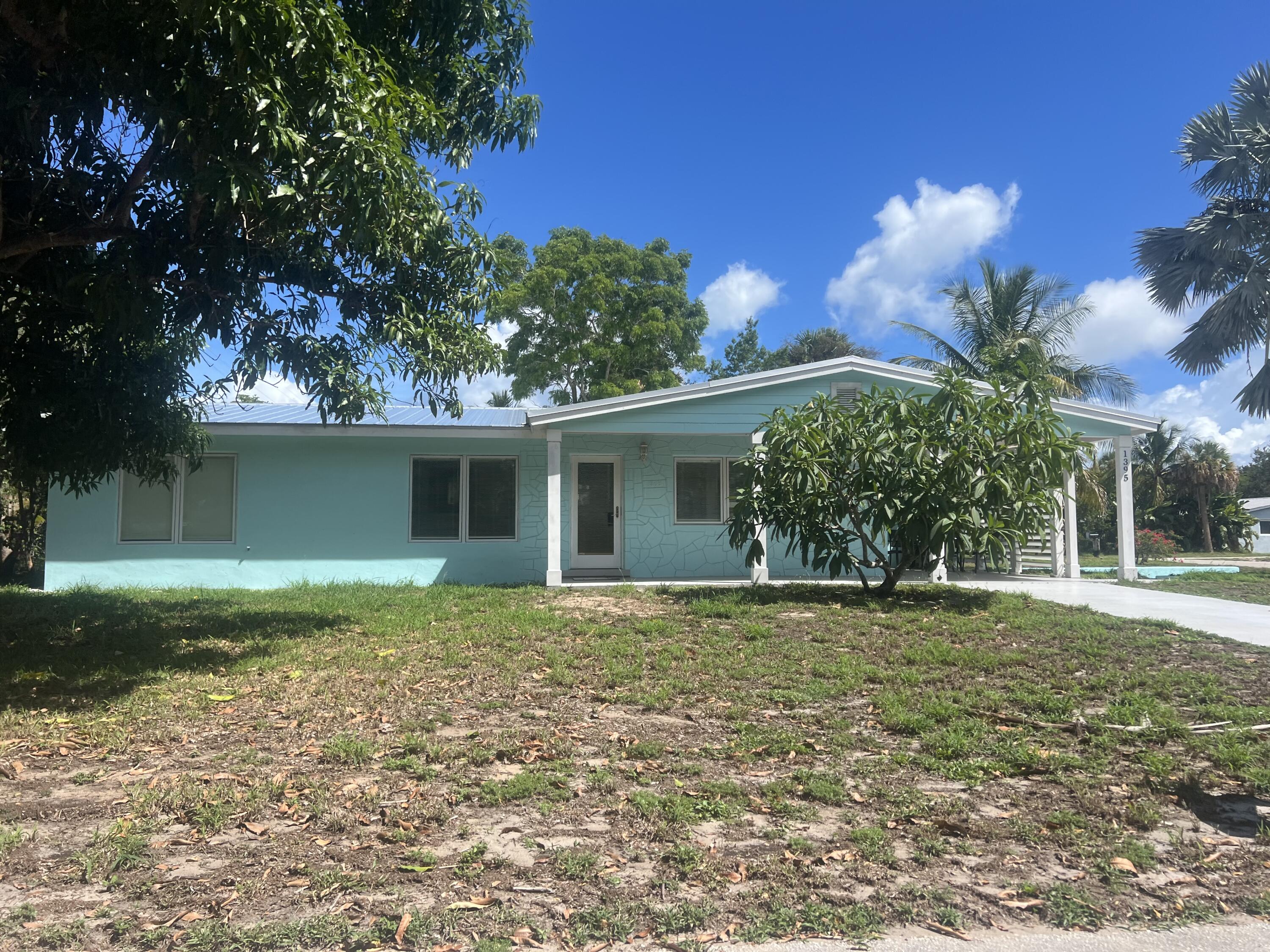 Single family home with 2 driveways 3-bedroom 2 bath on a large corner lot with plenty of room for all your ''toys'' Seconds from downtown Jensen Beach. The home also has a 3-year-old metal roof and AC. Impact Windows, Terrazzo Floors, quarts countertops, and stainless-steel appliance.The beach is 8 minutes away!Professional pictures will be taken!