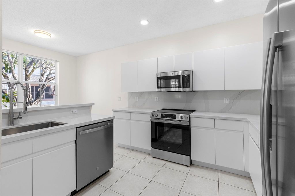 Photo of 872 Tanglewood Circle, Weston, FL 33327 (MLS # F10551016)