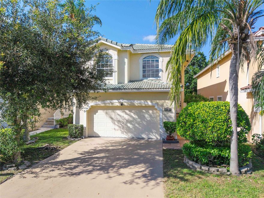 BEAUTIFULLY UPDATED TWO-STORY HOME IN THE HEART OF CORAL SPRINGS! THIS MOVE-IN READY 3 BED, 2.5 BATH RESIDENCE IS LOCATED ON A QUIET CUL-DE-SAC STREET AND FEATURES A LARGE TWO-CAR GARAGE. THE SPACIOUS FIRST FLOOR OFFERS AN OPEN LIVING AND DINING AREA, A BRIGHT EAT-IN KITCHEN WITH STAINLESS STEEL APPLIANCES, PANTRY, AND PLENTY OF COUNTER SPACE. A CONVENIENT HALF BATH IS PERFECT FOR GUESTS. FRESHLY PAINTED INTERIOR CREATES A MODERN AND INVITING FEEL. UPSTAIRS FEATURES BEAUTIFUL PARQUET FLOORING THROUGHOUT THREE BEDROOMS AND HALLWAY. THE PRIMARY SUITE INCLUDES AN UPDATED BATHROOM, AND THE SECOND FULL BATH HAS BEEN TASTEFULLY RENOVATED. LAUNDRY ROOM IS CONVENIENTLY LOCATED ON THE SECOND FLOOR. CLOSE TO TOP SCHOOLS, DINING, AND SHOPPING!