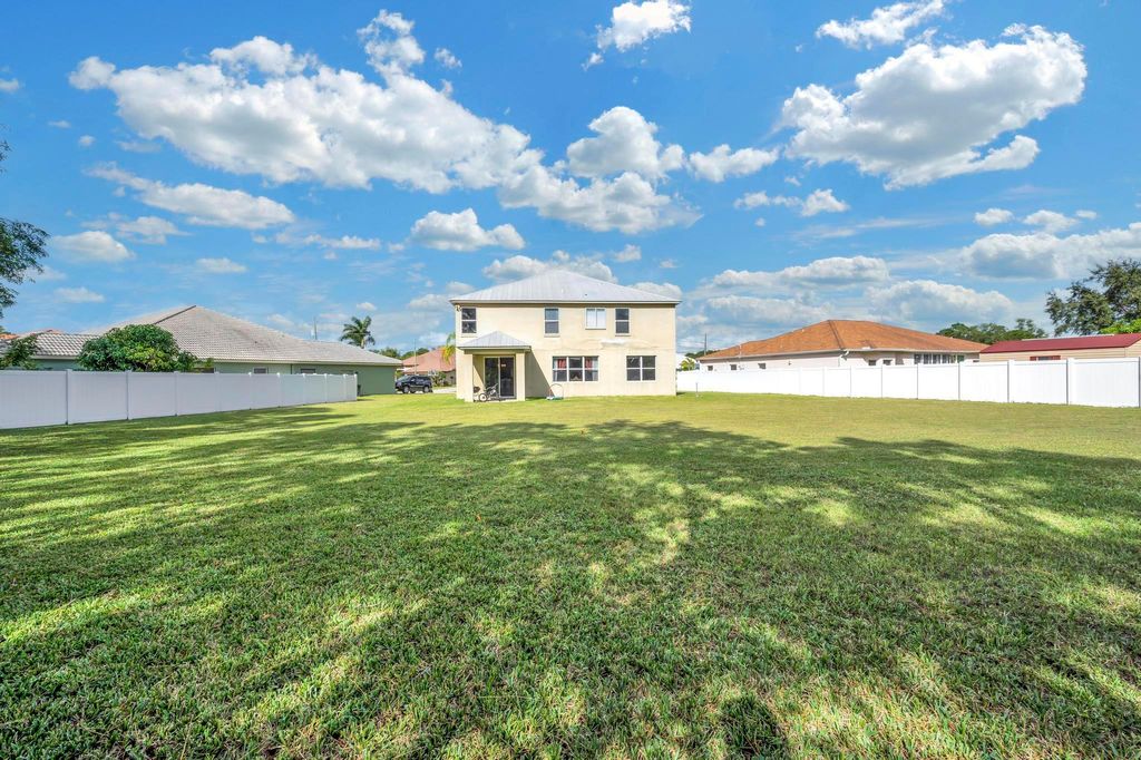 Photo of 5852 NW Leghorn Avenue, Port Saint Lucie, FL 34986 (MLS # R10940855)