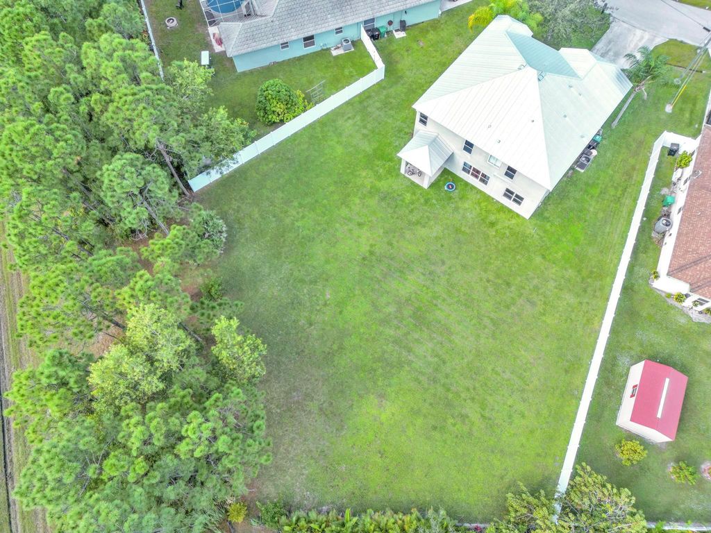 Photo of 5852 NW Leghorn Avenue, Port Saint Lucie, FL 34986 (MLS # R10940855)