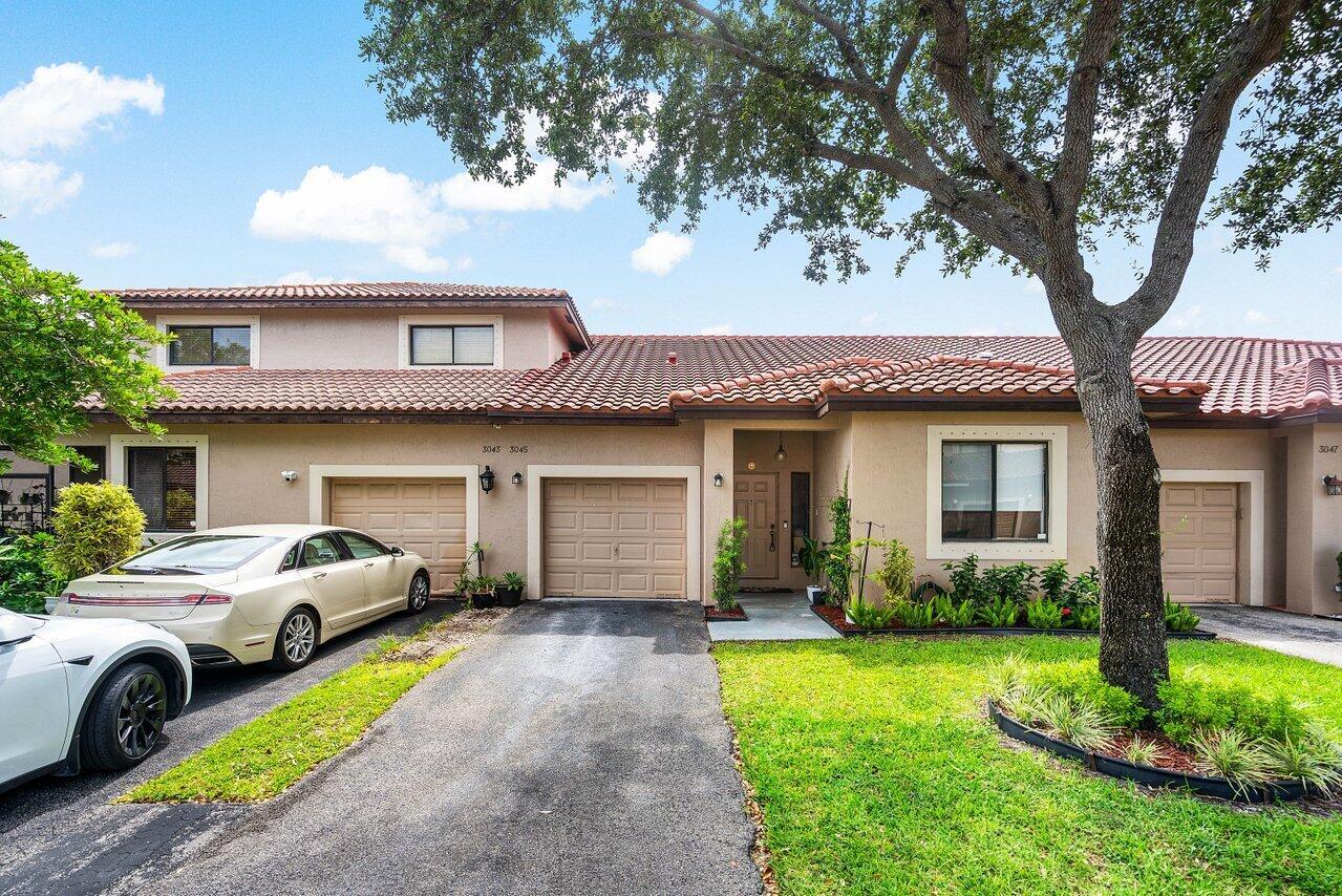 NEW ROOF! Welcome to this beautifully maintained 2-bedroom, 2-bathroom villa located in one of Lauderhill's most desirable gated communities. With three convenient entrances, this secure neighborhood offers privacy, peace of mind, and easy access to everything you need. Inside, you'll love the soaring high ceilings that create a bright, open, and airy feel. The split floor plan offers optimal privacy, with generously sized bedrooms and spacious living areas ideal for both relaxing and entertaining. This home features a new roof and full hurricane protection, giving you lasting security and comfort through any season. Step outside to your covered, screened-in patio--perfect for morning coffee or enjoying the Florida breeze in total privacy. Priced very reasonably, this villa is a rare find!