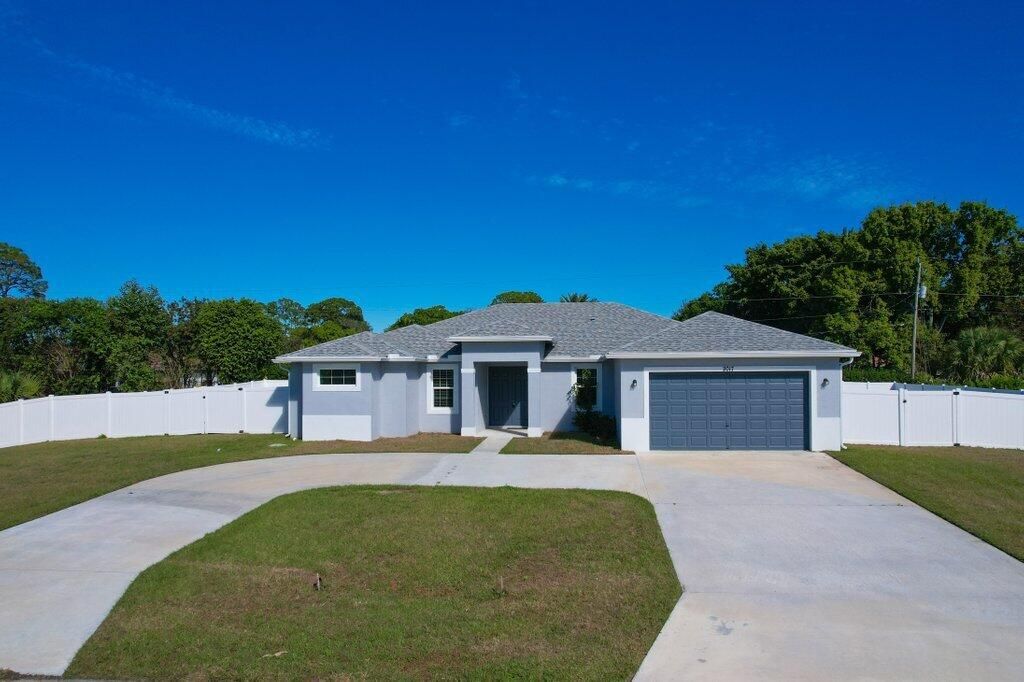 Photo of 2017 SW Justison Avenue, Port Saint Lucie, FL 34953 (MLS # R11160963)