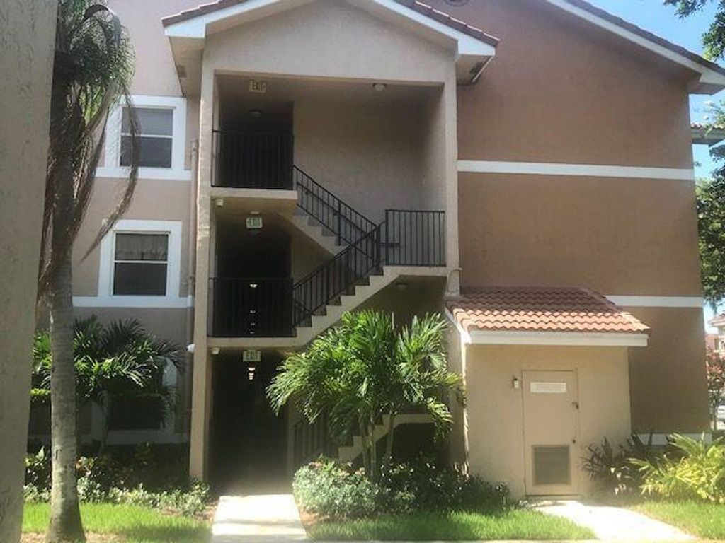 Photo of 8871 Wiles Road #101, Coral Springs, FL 33067 (MLS # R10732615)