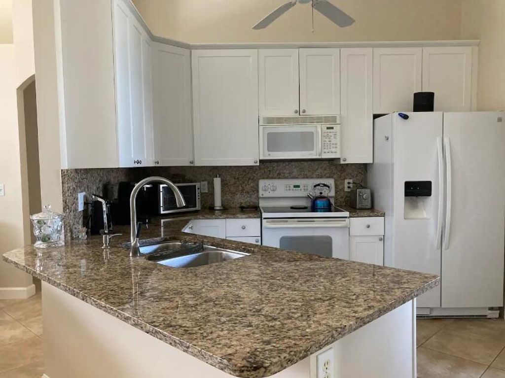 Photo of 6440 Foster Street, Jupiter, FL 33458 (MLS # R10985758)