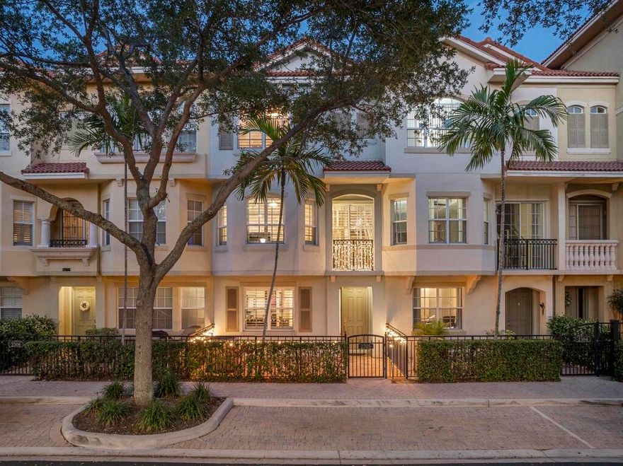 Pristine, light & bright 3-story townhome in the best location within the gated Harbour Oaks community, featuring stunning direct lake & fountain views! Meticulously maintained with an endless amount of upgrades, high-end designer features & thoughtful design throughout - this exceptional home is truly special. Some of the endless upgrades include Newer AC, New Hot Water Heater, Plantation Shutters throughout, Designer light fixtures & fans, upgraded flooring, custom cabinetry, upgraded Kitchen featuring Quartz countertops, SS appliances and the list goes on . Additional highlights include added overhead garage storage & a newly paved private courtyard. Ideally located in the heart of Palm Beach Gardens, walking distance to the Gardens mall, fine dining and 1 mile to 95. A MUST SEE!