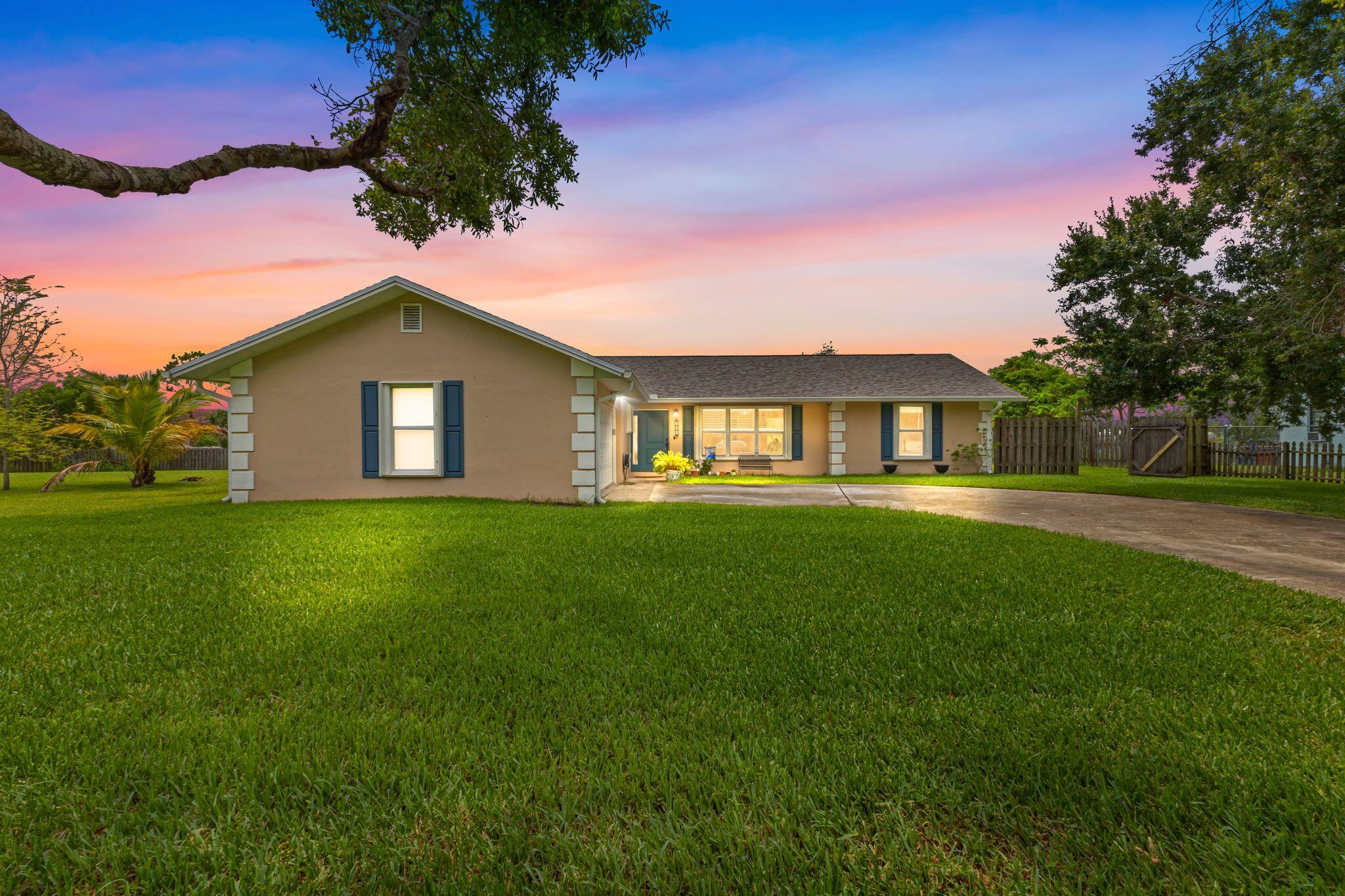 Your Dream Home Awaits! This recently updated 3 bedroom, 2 bathroom home is situated on a double lot for a total of .66 of an acre(2 parcels included with sale). Home has a great layout with living and family room. Upgrades include New Roof ( April 2025), New A/C (July 2024), Updated Kitchen (June 2025) and Updated Bathrooms (May 2024). Accordion Shutters makes it easy and fast to secure your home. Located in the quiet small community of Sandalwood Estates. Just 2 minutes to I-95, 10 minutes to downtown Ft. Pierce and 15 minutes to the beach. Enjoy low county only taxes. Don't let this opportunity pass you by.