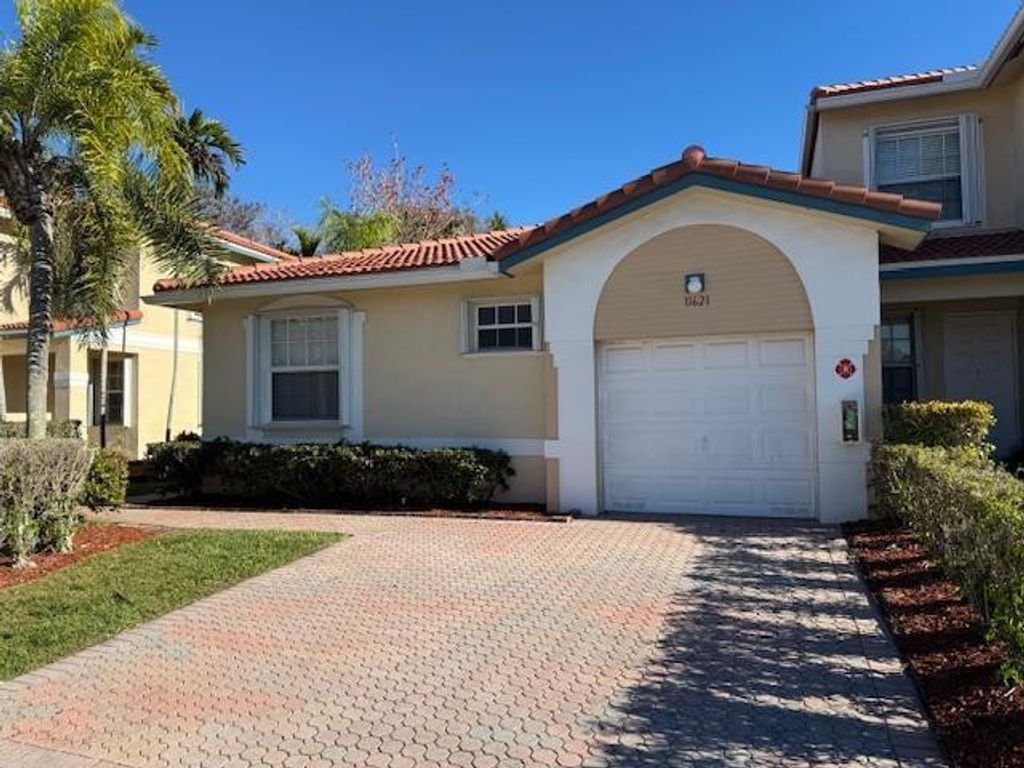Photo of 11621 NW 47th Drive, Coral Springs, FL 33076 (MLS # F10554186)