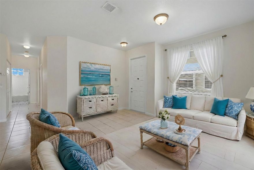 Welcome to this beautifully maintained corner villa in the highly sought-after gated community of Pelican Pointe at Wyndham Lakes. Featuring a desirable split floor plan, newer roof, and custom built-in California Closets, this home blends comfort with effortless style. The kitchen shines with stainless steel appliances and quartz countertops, while the main living areas offer tile flooring and the bedrooms feature fresh laminate. Fully hurricane-rated for peace of mind, with low HOA fees and FHA and VA eligibility—purchase with as little as 3% down. Zoned for top-rated schools including Stoneman Douglas and perfectly located near the Sawgrass, this villa offers the lifestyle everyone wants. Light, bright, and lovingly cared for, it’s the kind of home you move into and never want to leave.