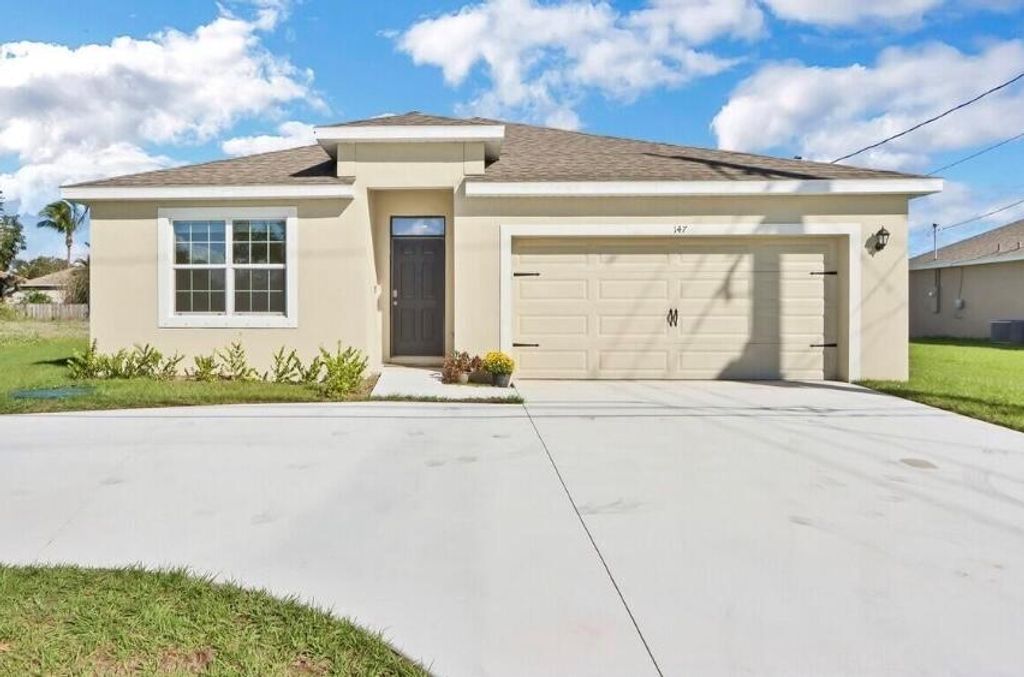 Photo of 147 SW Becker Road, Port St Lucie, FL 34953 (MLS # R10844310)