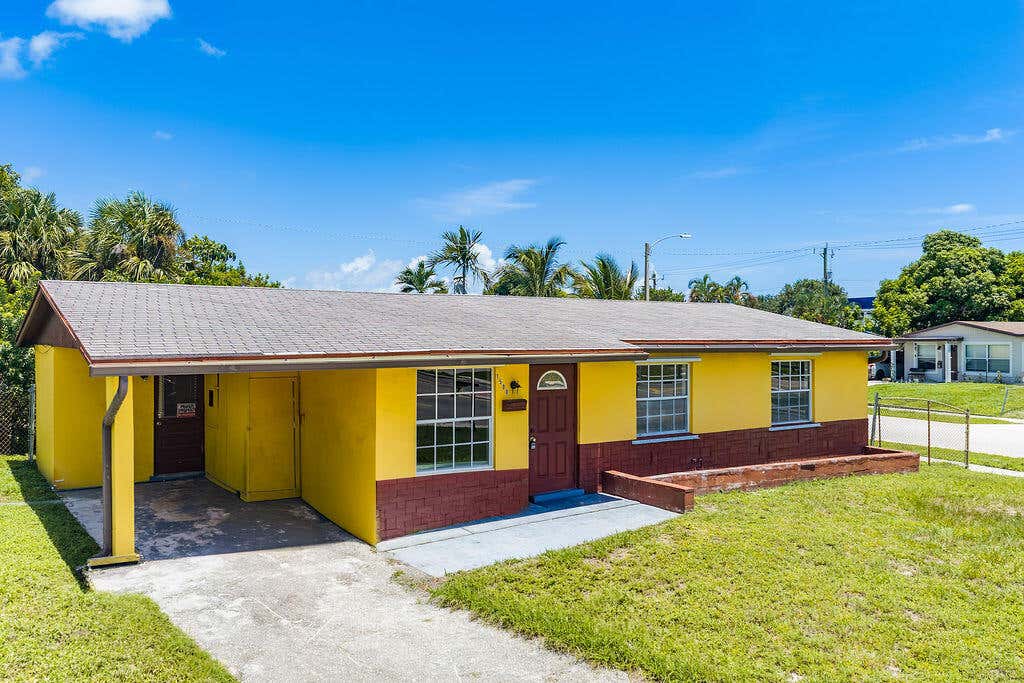 Photo of 1500 W 13TH Street W, Riviera Beach, FL 33404 (MLS # B26063580)