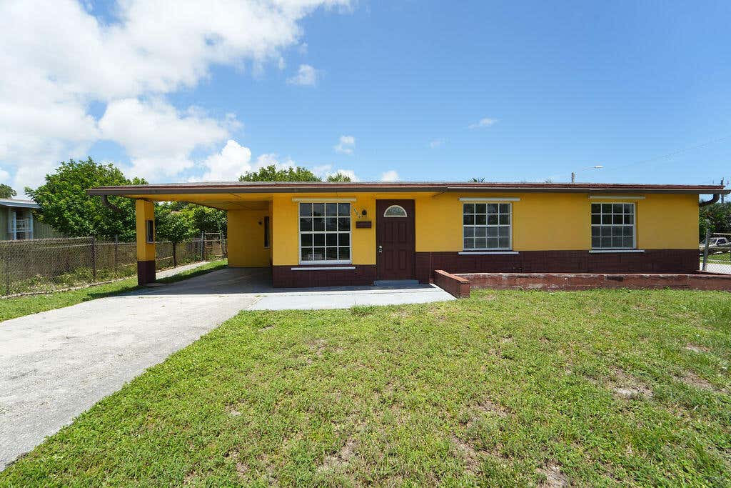 Photo of 1500 W 13TH Street W, Riviera Beach, FL 33404 (MLS # B26063580)