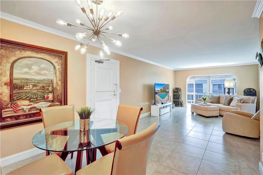 New Quartz countertops and NEW PRICE! Enjoy views of the water and boats from this pristine 2nd floor condo in Bay Colony Club! Impact windows & doors! Washer & Dryer in unit. Kitchen coffee bar. Crown moulding. Enclosed balcony provides extra interior space. Sliding paneled doors separate family room from 2nd bedroom/office. Bay Colony Club is a premier, gated, deep water Intracoastal community featuring 4 pools, 6 tennis courts, 3 clubhouses, 2 gyms, bike storage & boat dockage for $1.50/linear foot, on 30 acres of lush, manicured grounds. Owners can rent right away! Close to beach, shopping, restaurants, Las Olas, LBTS, Water Taxi. 24/7 security. Buyer needs 700 credit score and $50,000 net income/yr. Wine racks & dining room painting do not convey. SEE VIRTUAL TOUR.